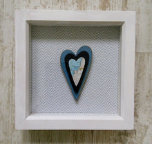 Box frame picture with map on triple hearts